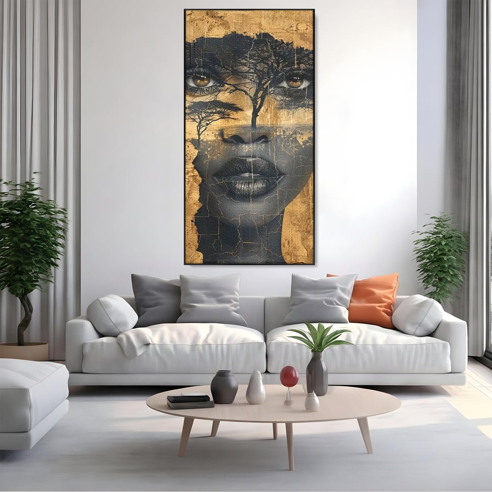 Tablou canvas cu tablou canvas cu chip de femeie si copaci, in rama de aluminiu negru, pe perete intr-un living